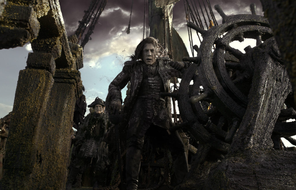 "PIRATES OF THE CARIBBEAN: DEAD MEN TELL NO TALES"..The villainous Captain Salazar (Javier Bardem) pursues Jack Sparrow (Johnny Depp) as he searches for the trident used by Poseidon...Ph: Film Frame..©Disney Enterprises, Inc. All Rights Reserved.